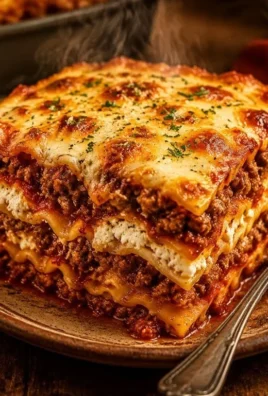 Delicious classic lasagna with layers of cheese, meat, and marinara sauce