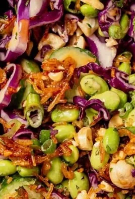 Bowl of vibrant Crispy Rice Salad with fresh vegetables and crunchy rice.