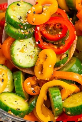 Cucumber and sweet pepper salad served in a bowl