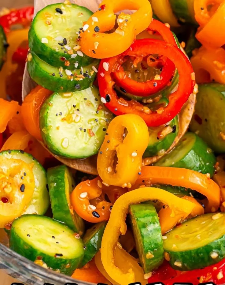 Cucumber and sweet pepper salad served in a bowl