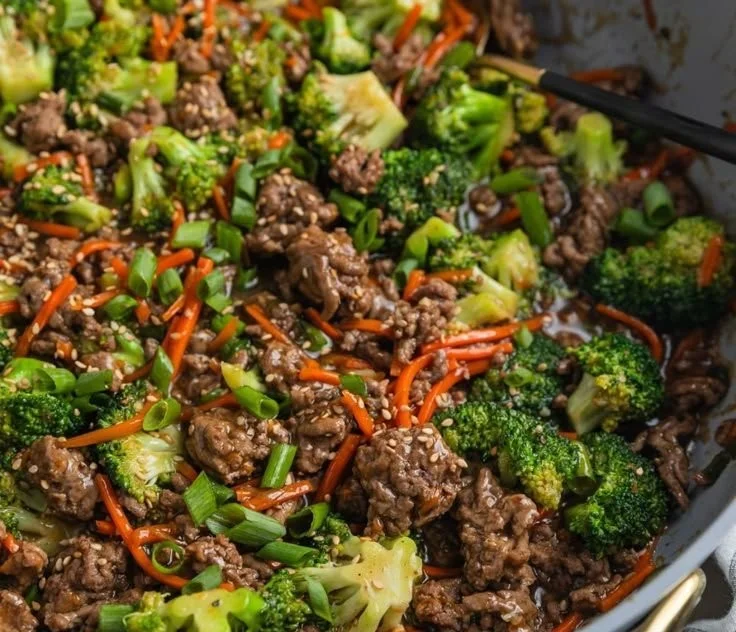 Delicious easy ground beef teriyaki served with rice and vegetables