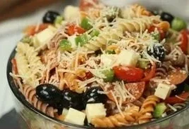 Colorful bowl of easy Italian Pasta Salad with fresh vegetables and dressing