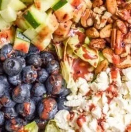 Fresh summer salad with blueberries and mixed greens