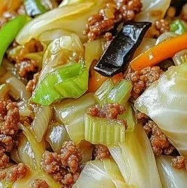 Chinese ground beef and cabbage stir fry in a skillet