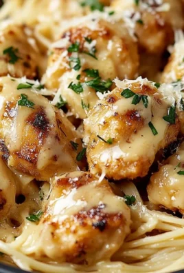 Garlic Butter Chicken Bites with Creamy Parmesan Pasta served on a plate