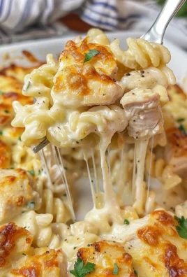 Delicious Garlic Parmesan Chicken Pasta Bake with creamy sauce and cheese