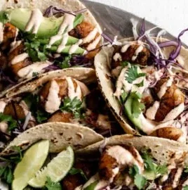 Delicious grilled honey lime shrimp tacos topped with fresh ingredients