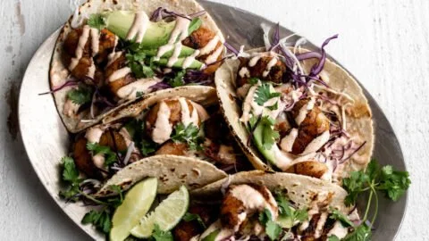Delicious grilled honey lime shrimp tacos topped with fresh ingredients