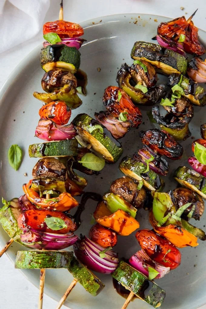 Colorful grilled vegetables on a barbecue grill, perfect for healthy meals