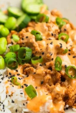 Ground turkey rice bowl with Bang Bang sauce and vegetables