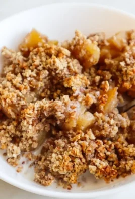 Healthy breakfast apple crumble with oats and fresh apples