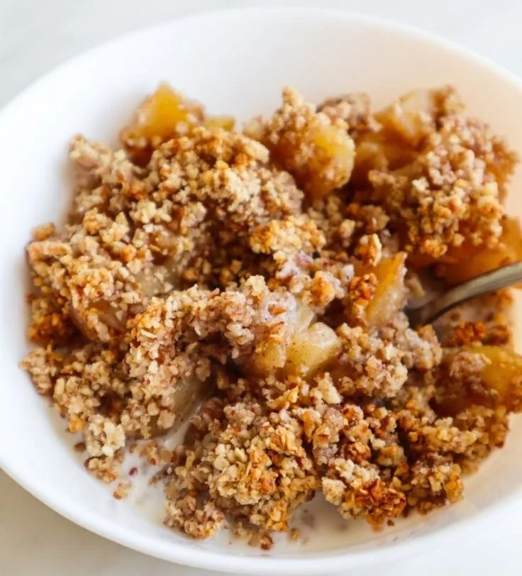Healthy breakfast apple crumble with oats and fresh apples