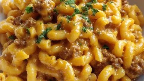 Creamy homemade hamburger helper served in a skillet, easy one-pan meal.