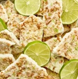 Delicious Key Lime Pie Yogurt Bark topped with lime zest and graham cracker crumbs.