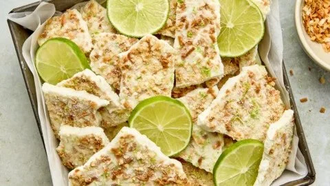 Delicious Key Lime Pie Yogurt Bark topped with lime zest and graham cracker crumbs.