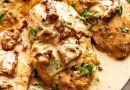 Delicious Marry Me Chicken served with creamy sauce and herbs