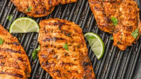 Delicious Mexican Chicken breast served with spices and vibrant toppings