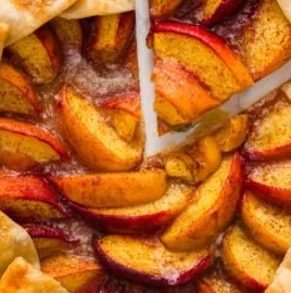 Freshly baked Peach Galette with golden crust and juicy peach filling