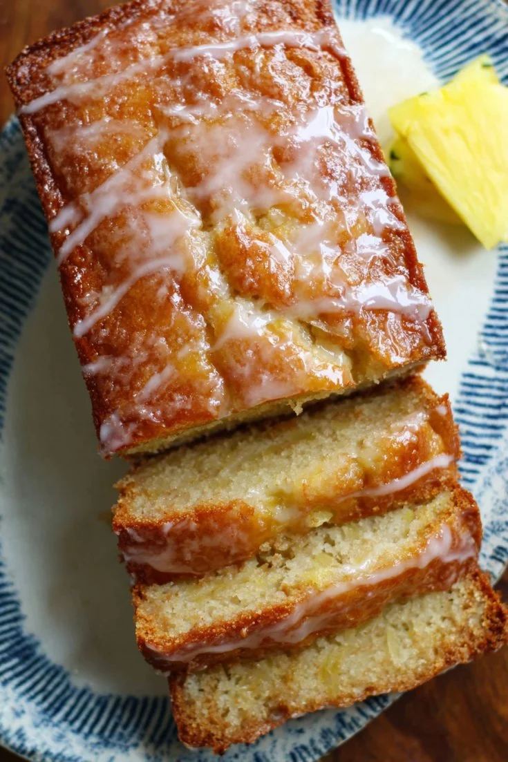 Freshly baked pineapple bread with golden crust and juicy pineapple pieces