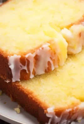 Freshly baked pineapple bread with a golden crust and pineapple pieces.