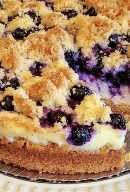 Blueberry cream cheese crumb cake with fresh blueberries and crumb topping