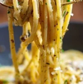 Delicious garlic butter chicken pasta served in a bowl, ready for a quick dinner.