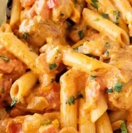 Delicious Southwest Chicken Alfredo pasta dish topped with herbs and spices