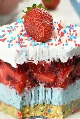 Delicious Summer Berry Jello Lasagna with layers of fruit and creamy filling