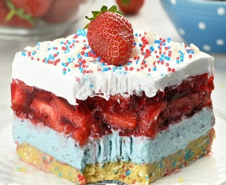 Delicious Summer Berry Jello Lasagna with layers of fruit and creamy filling