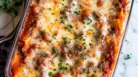 Delicious homemade lasagna recipe, layers of pasta, cheese, and sauce