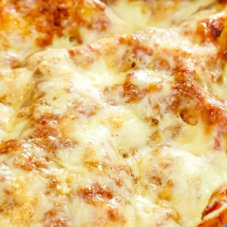 Delicious cheese lasagna ready to be served, featuring layers of cheese and pasta