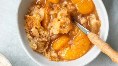 Southern peach cobbler with fresh peaches and a golden crust